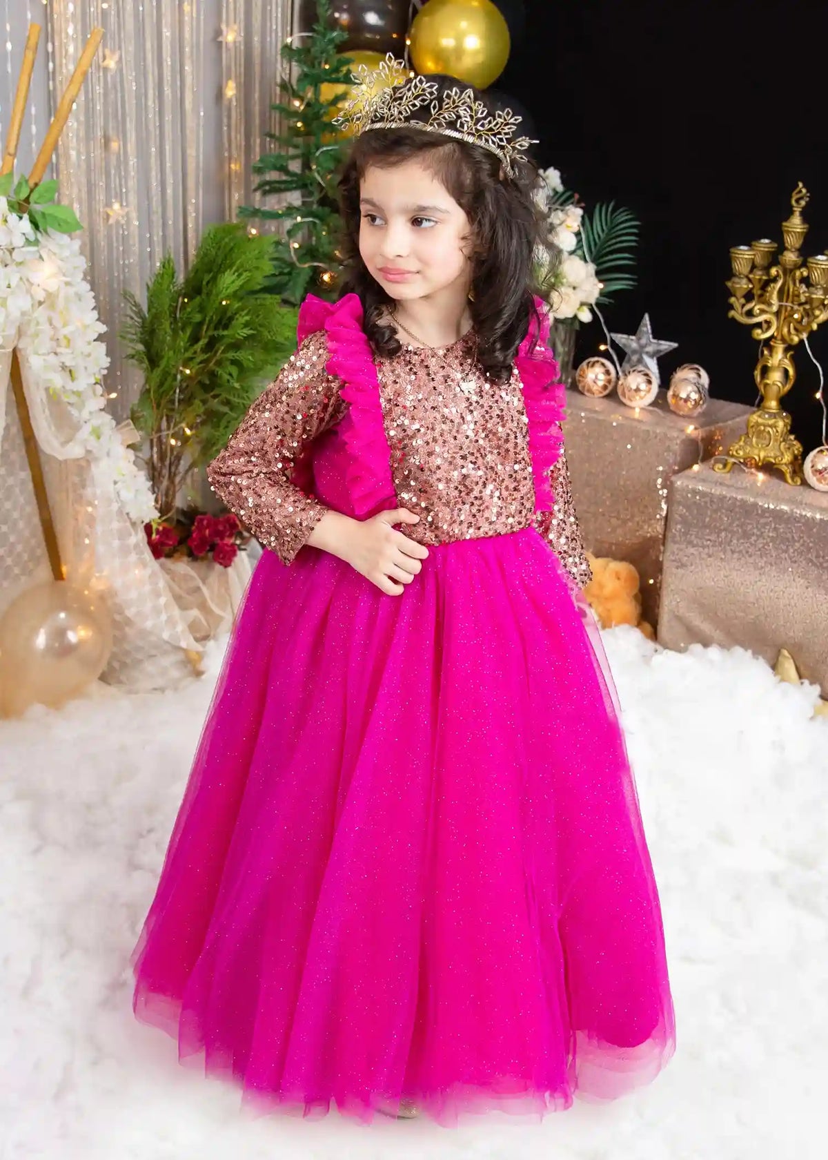 Front view of sparkling tulle princess dress with sequin bodice and layered skirt