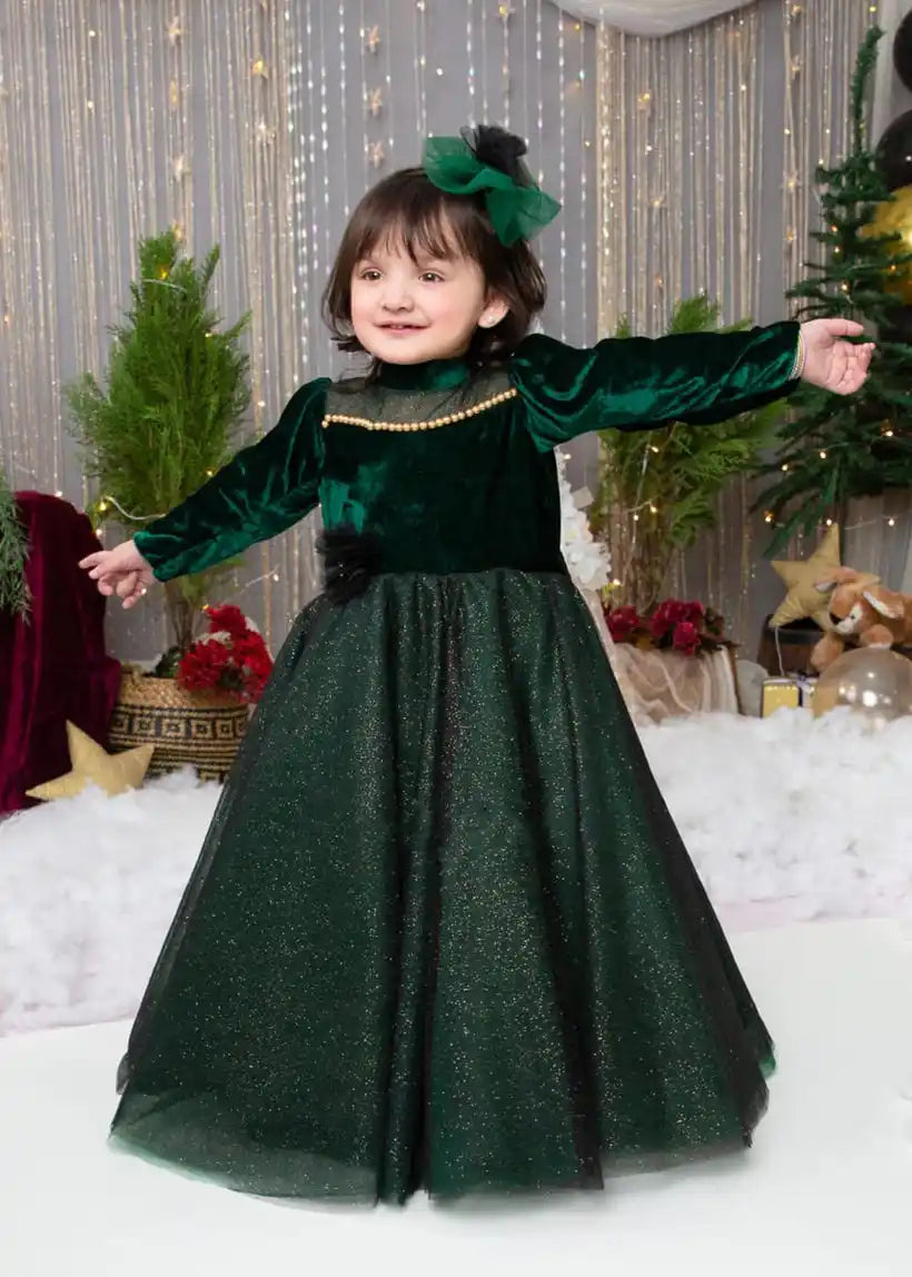 Front view of long sleeve velvet and sparkling tulle dress for girls’ holiday events.