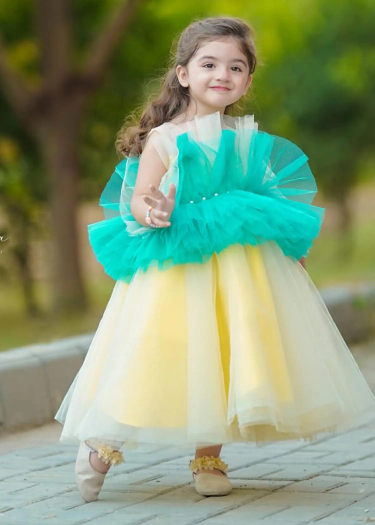 Front view of Girls' Tulle Party Dress in green and yellow