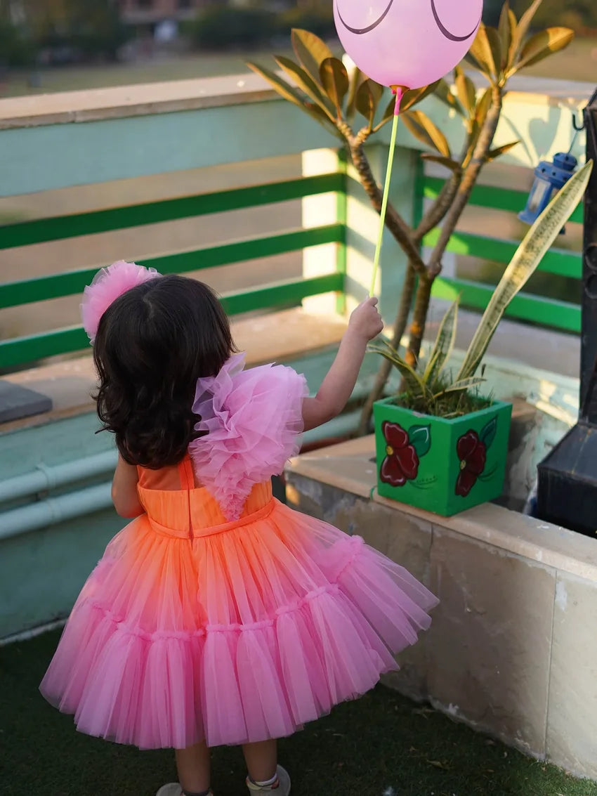 Back view of colorful puffy tulle birthday dress for girls with layered skirt