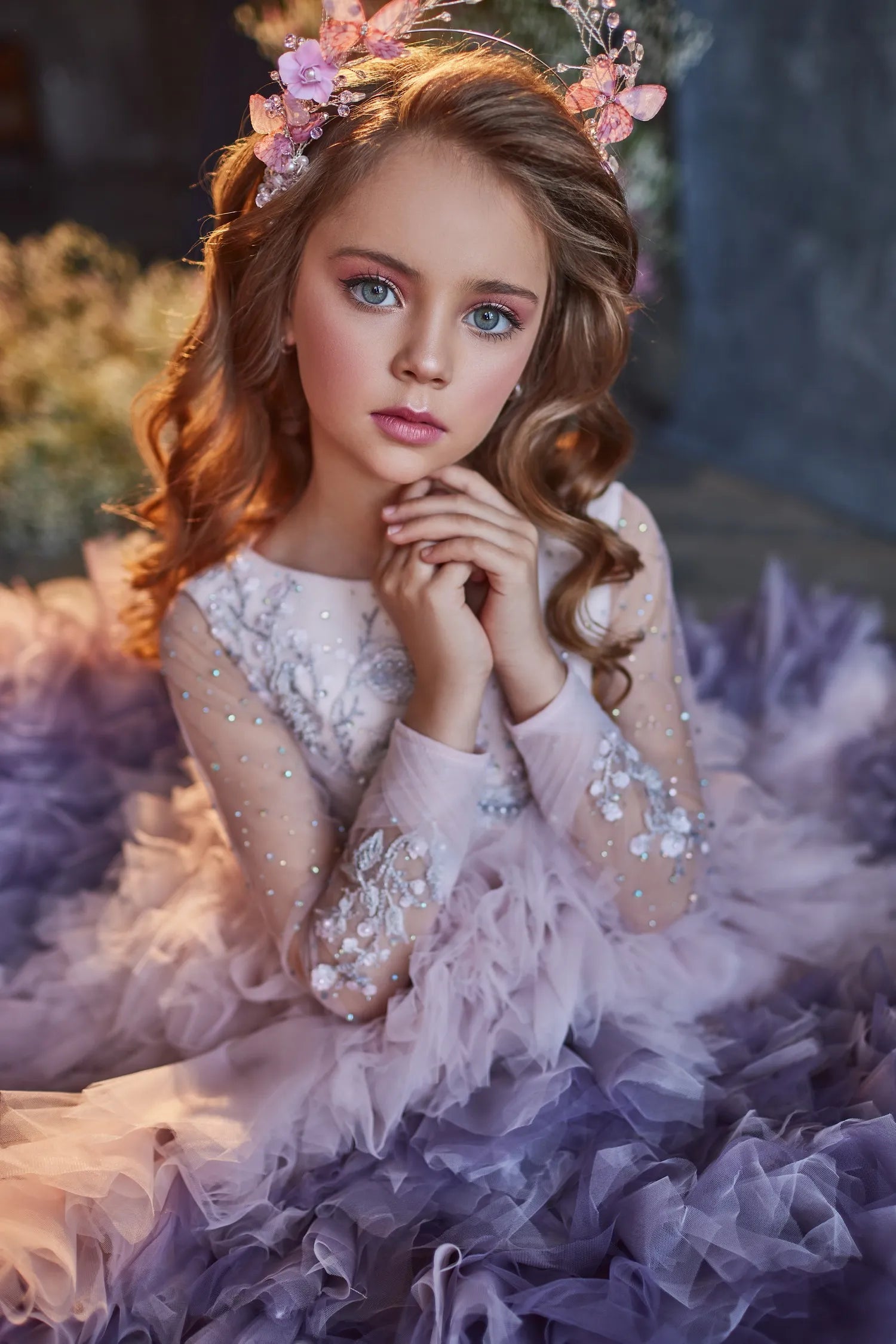 Close-up of the intricate lace bodice and floral embellishments of the luxury formal gown.