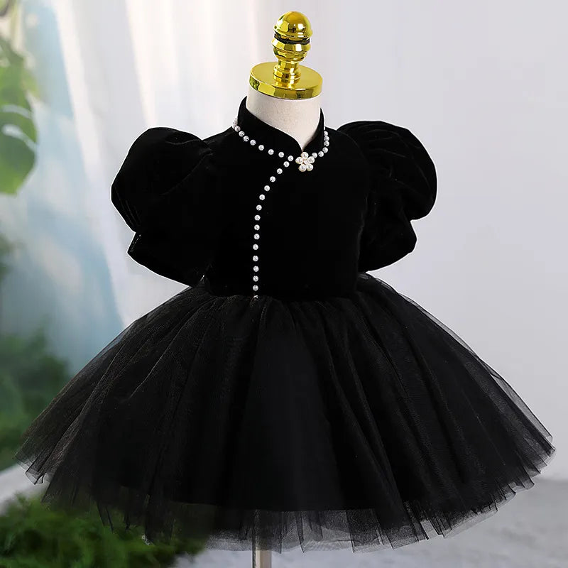 side view of Black Velvet Dress – classic knee-length dress with delicate tulle skirt