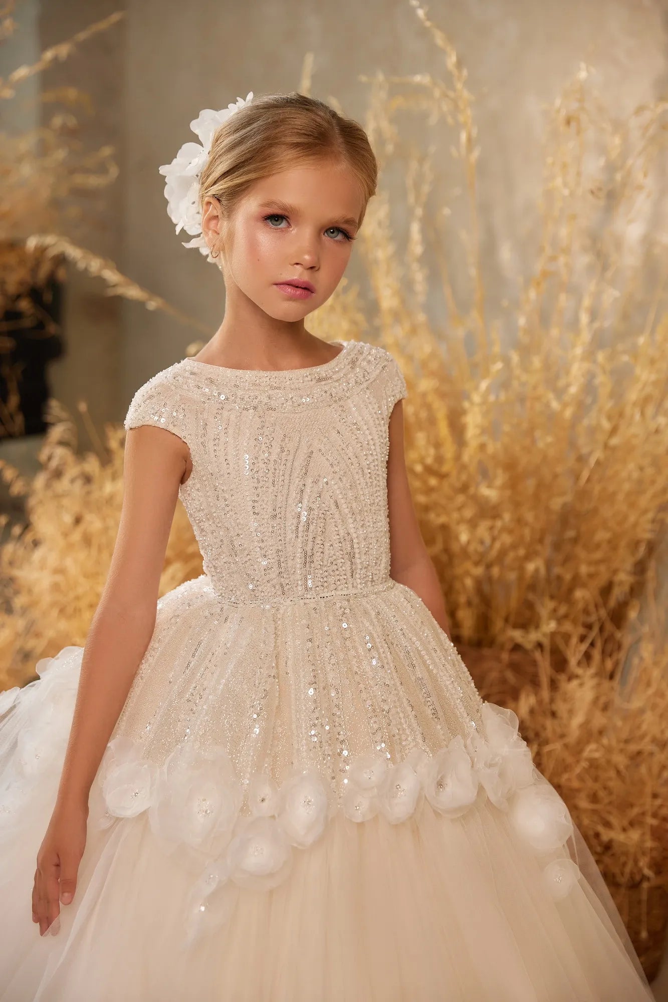 Close-up view of the delicate sequins and lacework on the Choosify luxury flower girl dress.