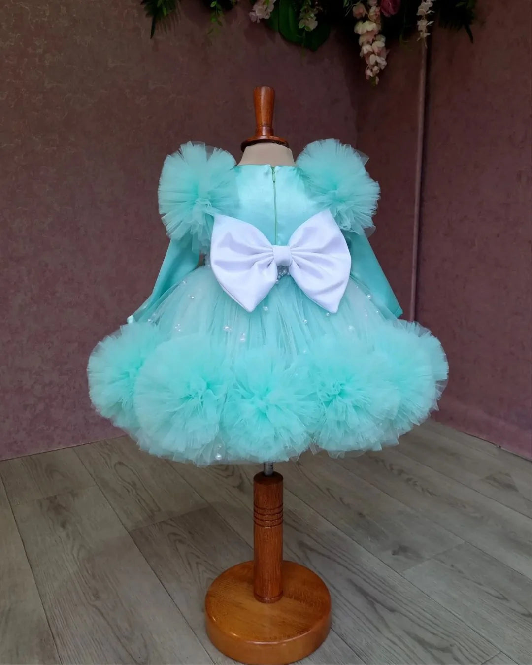 Back side view of Aqua Blue Tulle Dress for girls with princess-style layers