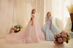 Blue Side view of Blush Pink & Powder flower girl dress with delicate ruffled sleeves and elegant tulle layers.