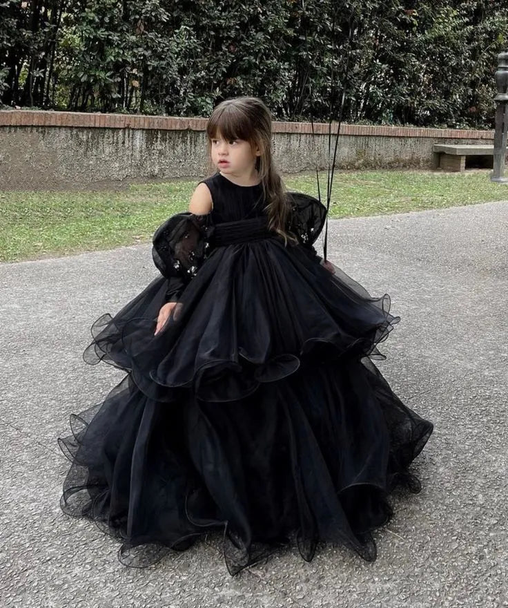 Front view of black layered organza flower girl gown for formal occasions.