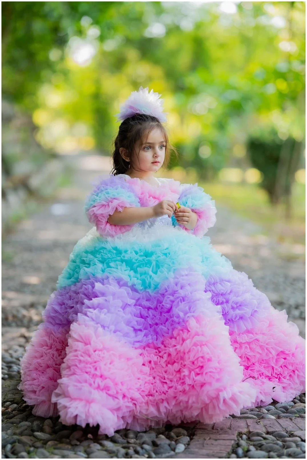 Close-up of layered tulle ruffles on Rainbow Tulle Ruffled Dress for kids