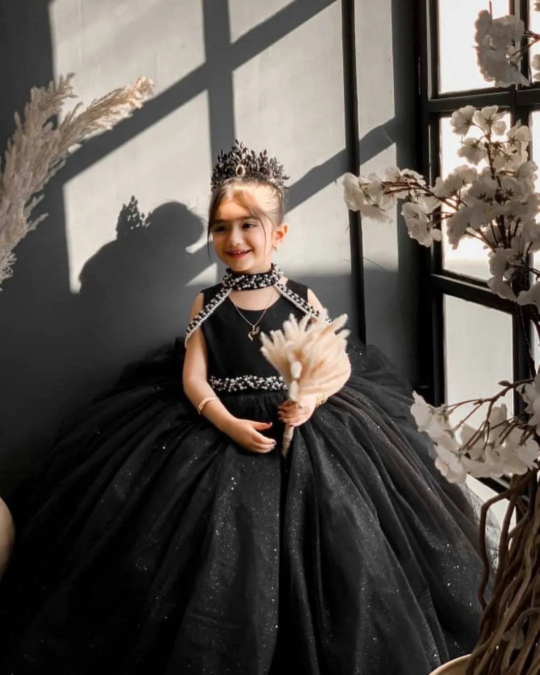 Front view of Black Sparkling Princess Tulle Gown with a flowy, layered tulle skirt and glitter accents.