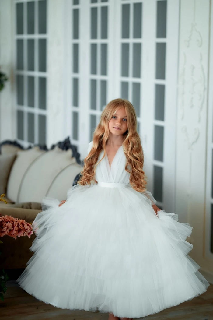 Side view of White Tiered Tulle Pageant Dress for girls, showcasing layered tulle and classic elegance.