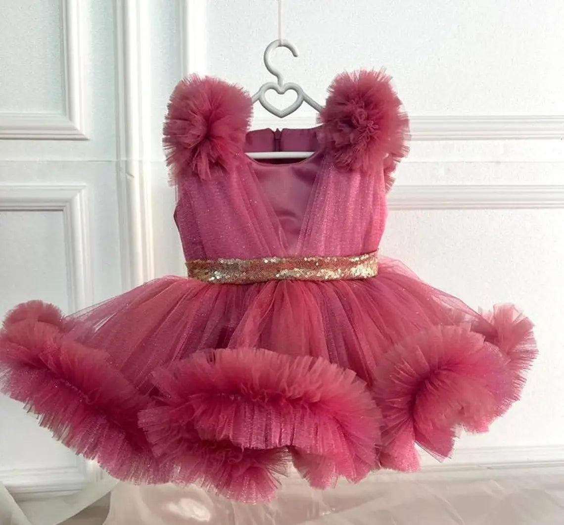 Front view of a sparkling dusty rose princess tutu dress for girls, featuring a sequin belt and soft tulle layers.