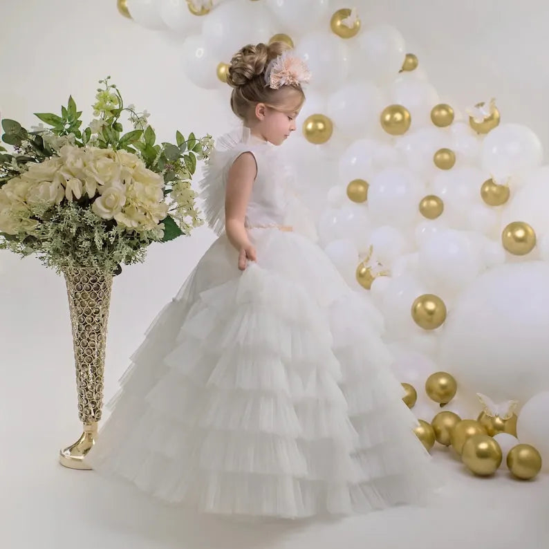 Side view of Layered Tulle Gown with Delicate Ruffled Straps – elegant kids’ wedding dress with ruffled straps