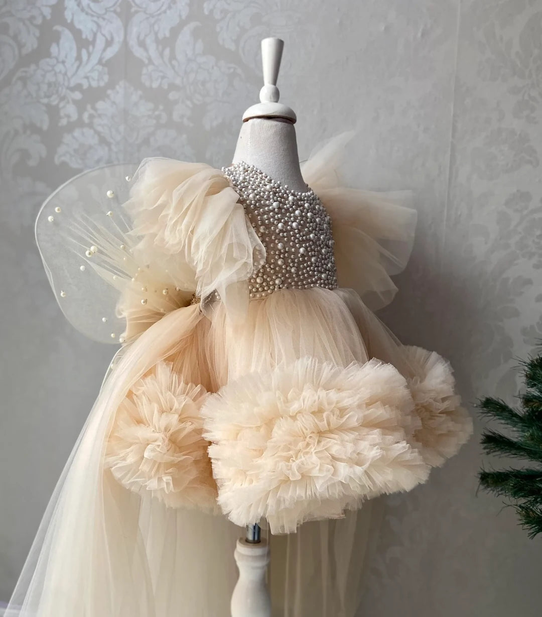 Front view of Pearl Tulle Dress with Butterfly Wings – luxurious girls’ formal gown with pearls