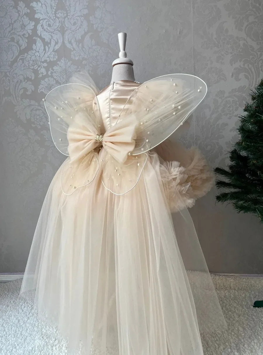 Back view of Pearl Tulle Dress with Butterfly Wings – elegant dress with butterfly wings for girls