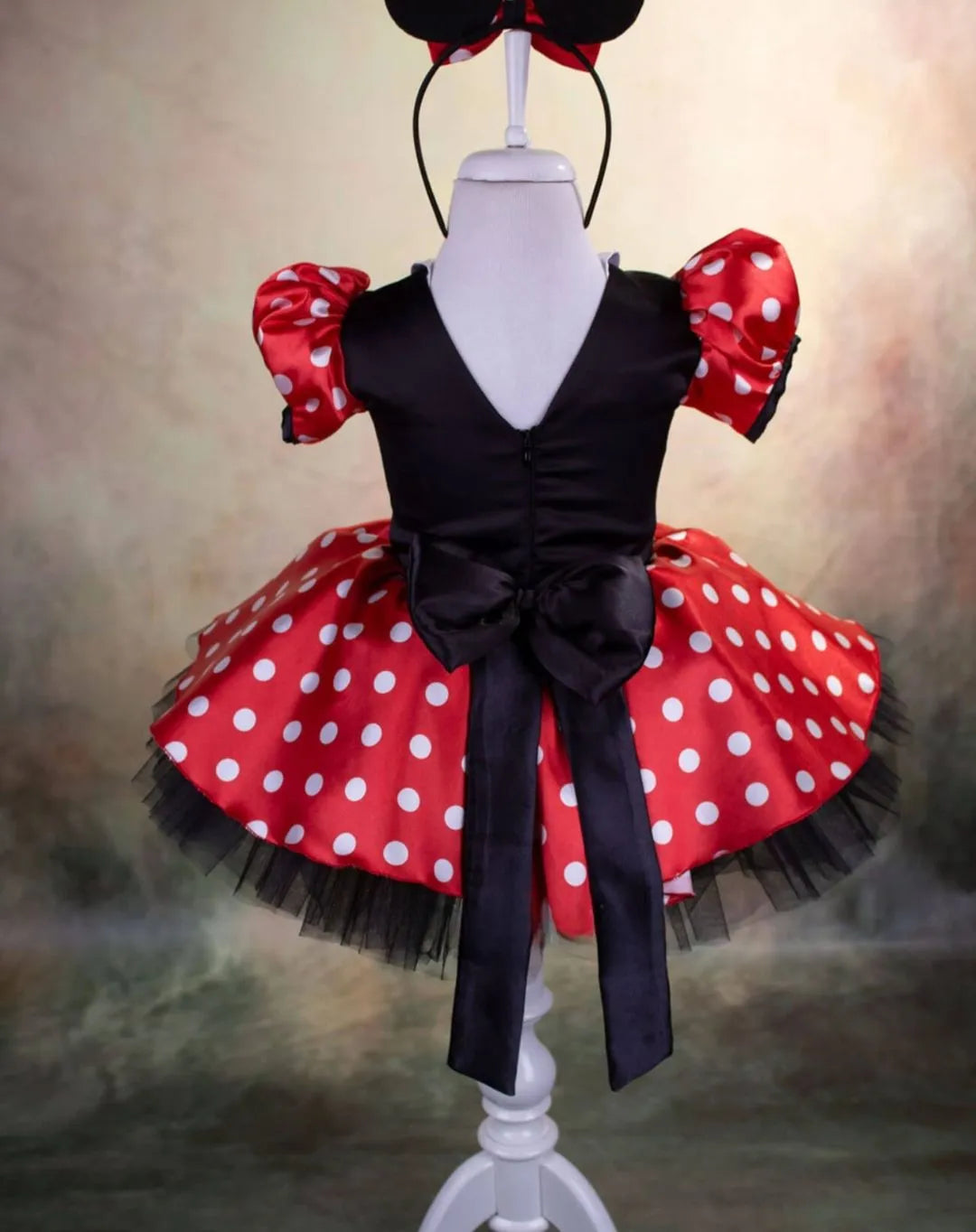 Back view of the girls' Mickey Mouse dress, highlighting the dress’s playful details and high-quality fabric.